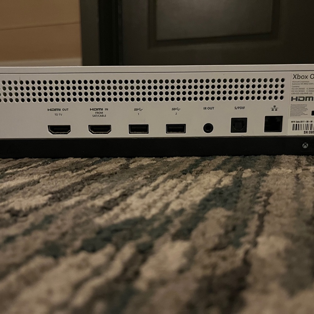 Xbox One S in good condition runs smooth!